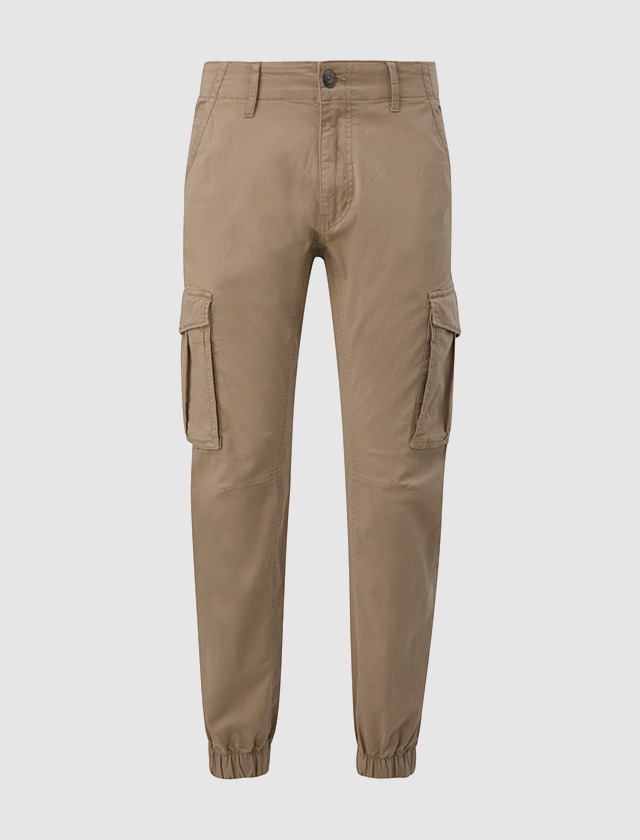 Beige Cargo-Hose mit elastischem Bund und seitlichen Taschen. Beige Cargo-Hose mit elastischem Bund und seitlichen Taschen.