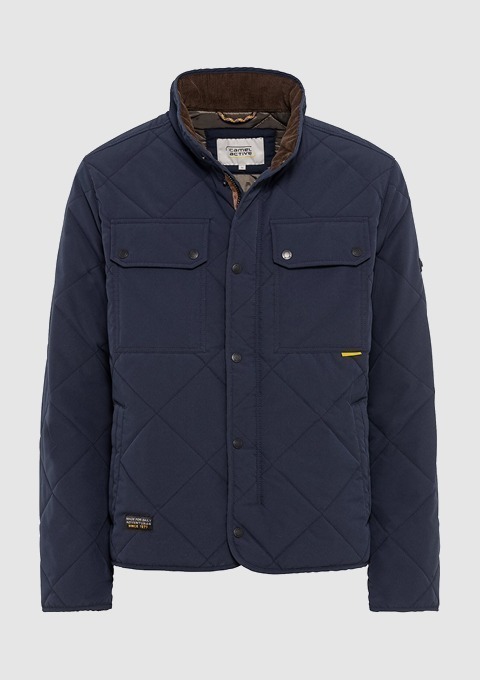Dunkelblaue gesteppte Jacke mit Knöpfen und zwei Brusttaschen. Dunkelblaue gesteppte Jacke mit Knöpfen und zwei Brusttaschen.