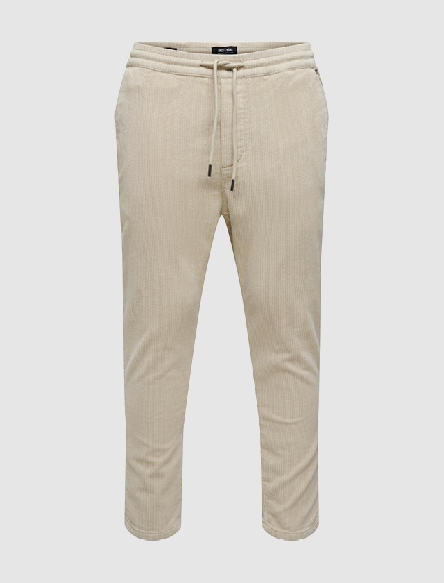 Beige Jogginghose mit elastischem Bund und Kordelzug. Beige Jogginghose mit elastischem Bund und Kordelzug.