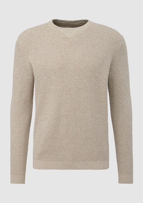 Beiger Pullover mit V-Ausschnitt und strukturiertem Material. Beiger Pullover mit V-Ausschnitt und strukturiertem Material.