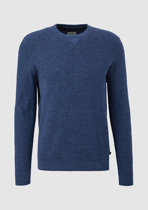 Ein blauer Pullover mit langem Arm und runden Ausschnitt. Ein blauer Pullover mit langem Arm und runden Ausschnitt.