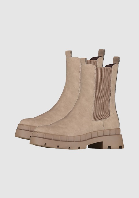 Beige Chelsea-Boots mit rutschfester Sohle und elastischen Einsätzen.
