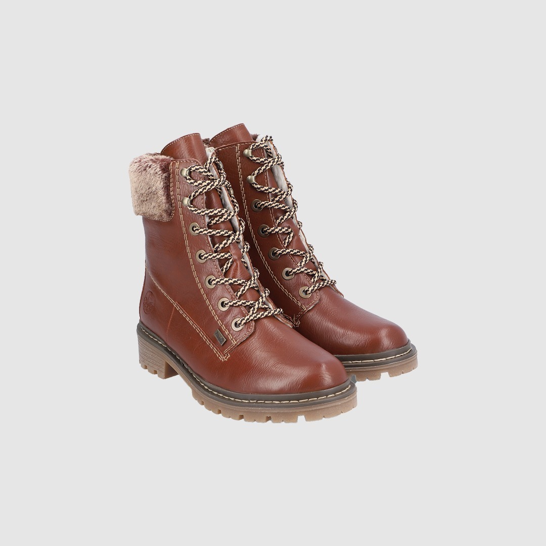 Braune Lederstiefel mit Schnürung und Kunstfellbesatz.
