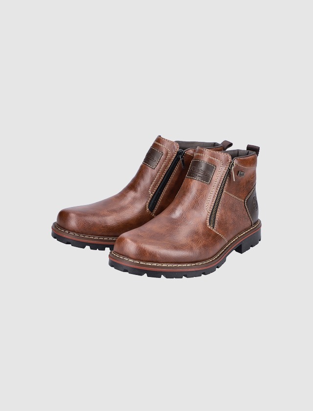 Braune Boots mit Reißverschluss.
