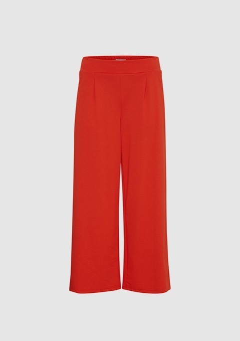 Rote, weite Hose mit elastischem Bund.