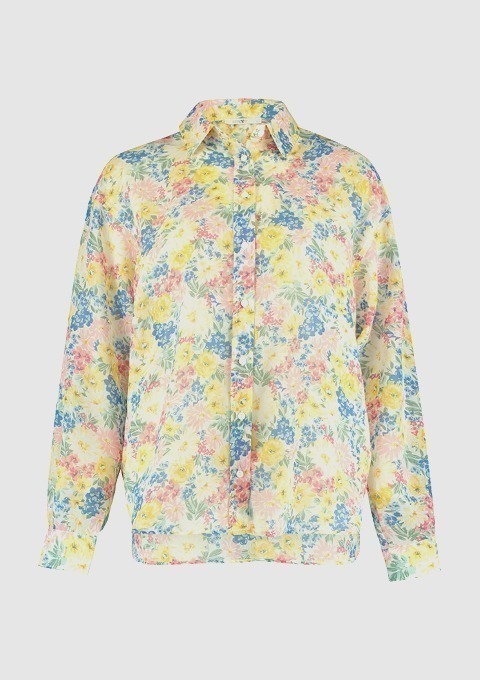 Bluse mit floralem Muster in Gelb, Blau und Rosa. Bluse mit floralem Muster in Gelb, Blau und Rosa.