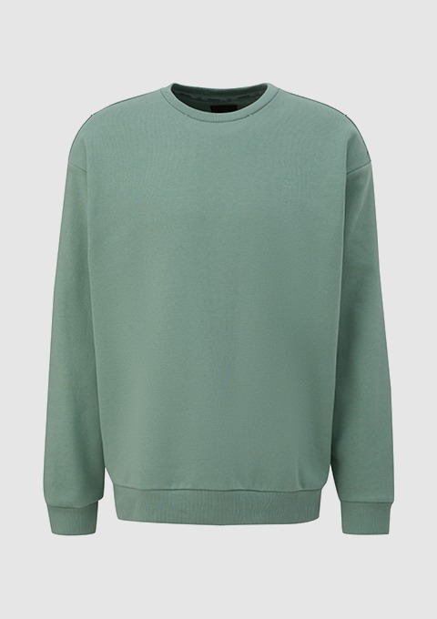Ein einfarbiger, grüner Pullover mit Rundhalsausschnitt. Ein einfarbiger, grüner Pullover mit Rundhalsausschnitt.