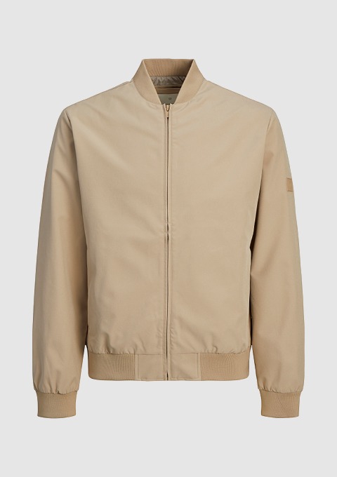 Beige Bomberjacke mit Reißverschluss und elastischen Bündchen. Beige Bomberjacke mit Reißverschluss und elastischen Bündchen.