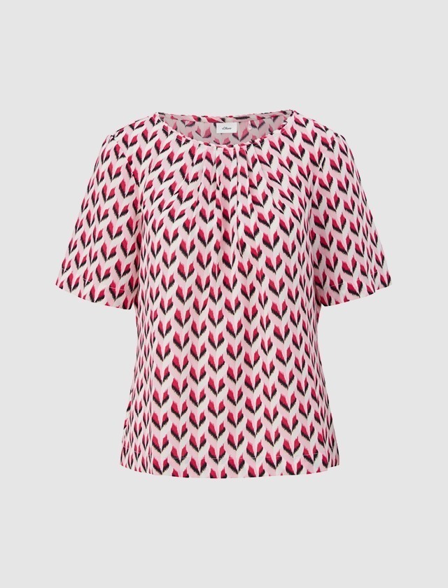 Ein kurzärmliges Oberteil mit einem pinken und schwarzen Muster. Ein kurzärmliges Oberteil mit einem pinken und schwarzen Muster.