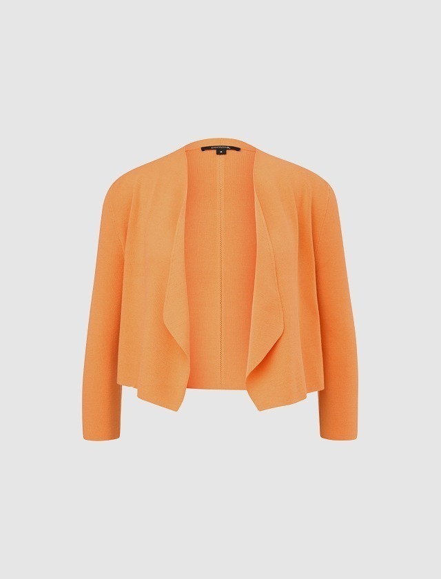 Ein oranger Cardigan ohne Knöpfe. Ein oranger Cardigan ohne Knöpfe.
