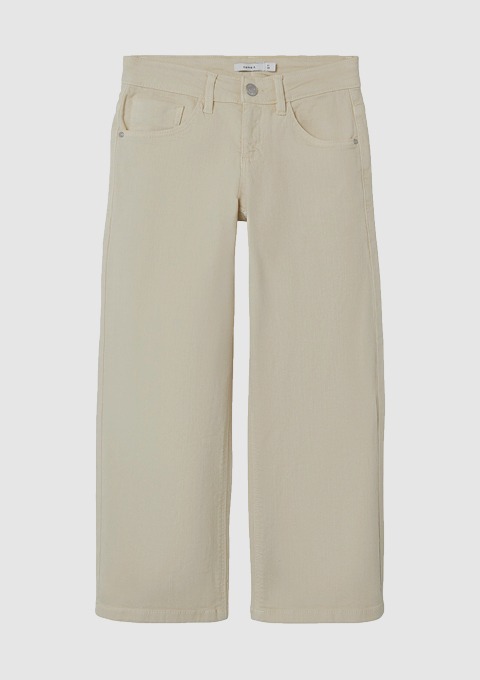 Beige Jeans mit weitem Schnitt. Beige Jeans mit weitem Schnitt.