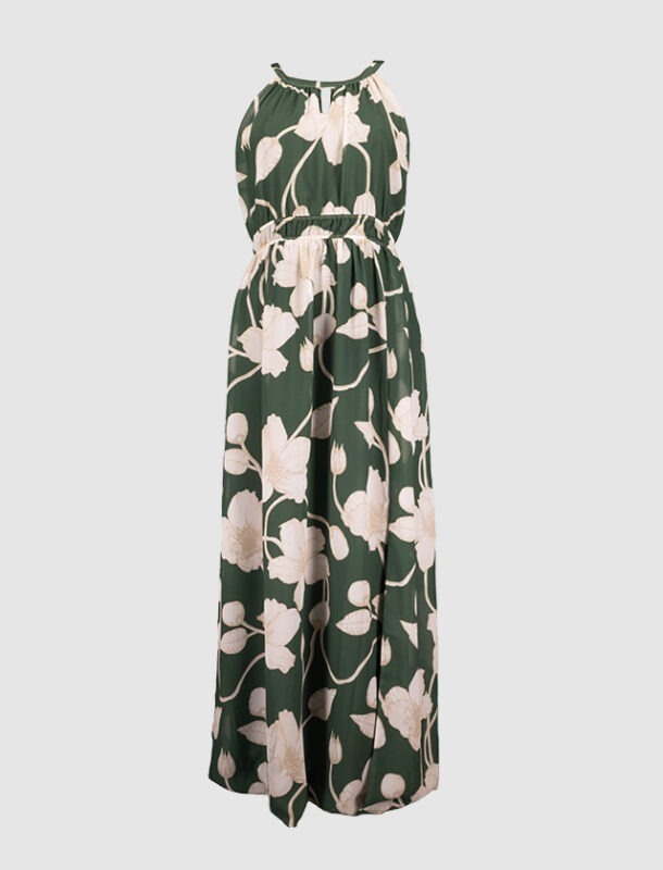 Ein langes, ärmelloses Kleid mit grünem Hintergrund und weißen Blumenmustern.