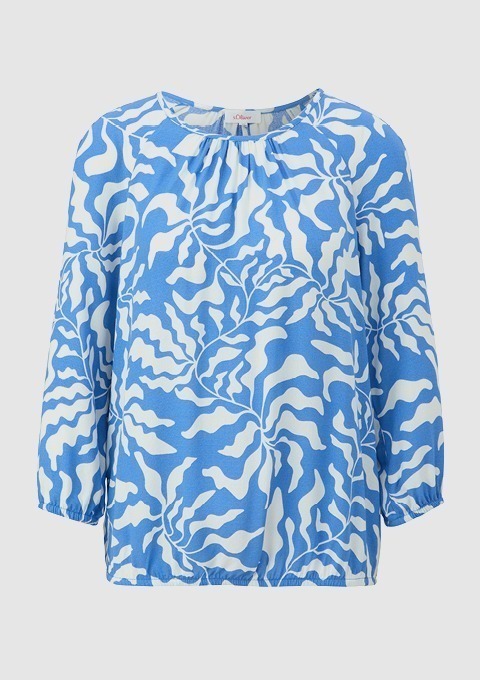 Langarm-Bluse mit einem blauen und weißen, wellenförmigen Muster.
