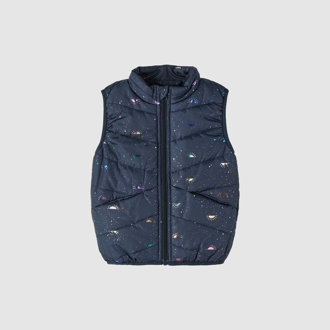 Eine dunkelblaue Weste mit einem gepunkteten Muster aus bunten, stilisierten Sonnen. Eine dunkelblaue Weste mit einem gepunkteten Muster aus bunten, stilisierten Sonnen.
