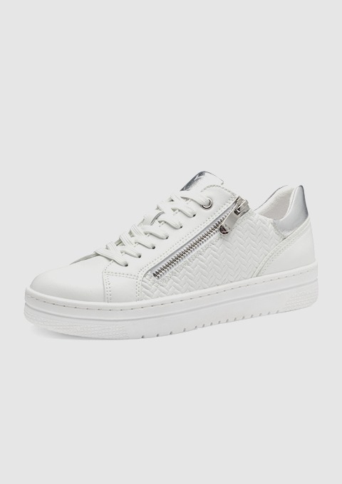 Ein weißer Sneaker mit einem Reißverschluss und strukturiertem Obermaterial.