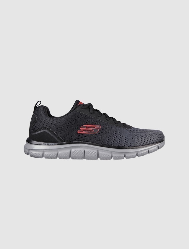 Schwarze Sportschuhe mit roten Akzenten.