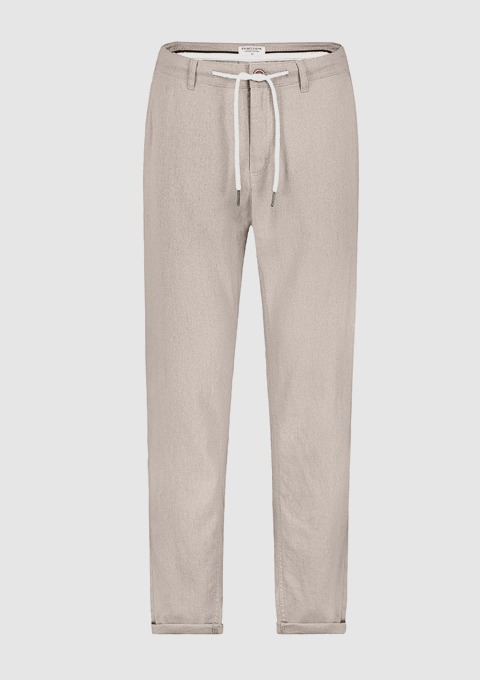 Beige Jogginghose mit weißem Kordelzug. Beige Jogginghose mit weißem Kordelzug.