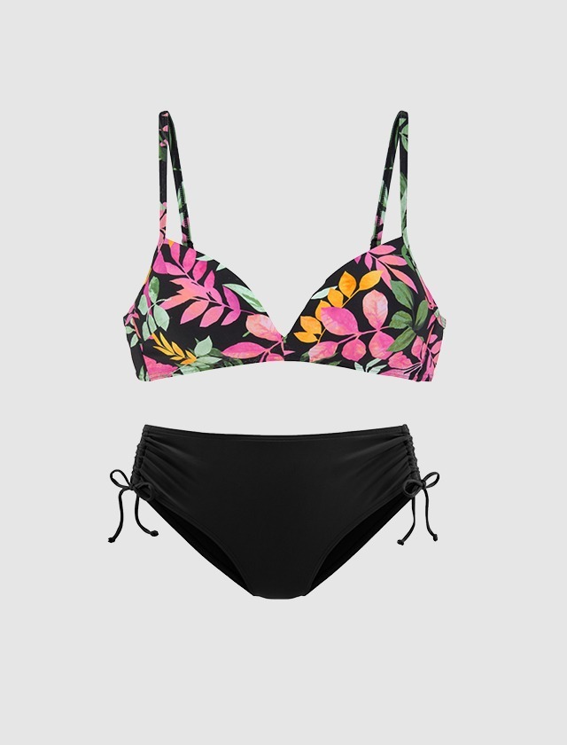 Ein Bikini mit einem Blumenmuster in Pink und Grün auf der Oberseite und einer schwarzen Unterhose. Ein Bikini mit einem Blumenmuster in Pink und Grün auf der Oberseite und einer schwarzen Unterhose.