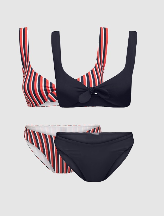 Ein Badeanzug-Set mit gestreiftem Oberteil in Rot und Schwarz sowie schwarzen Shorts. Ein Badeanzug-Set mit gestreiftem Oberteil in Rot und Schwarz sowie schwarzen Shorts.