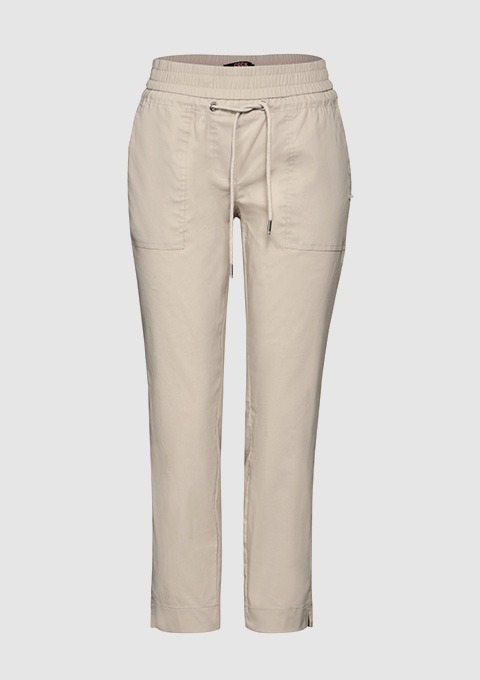 Beige Baumwollhose mit einem elastischen Bund und Kordelzug.