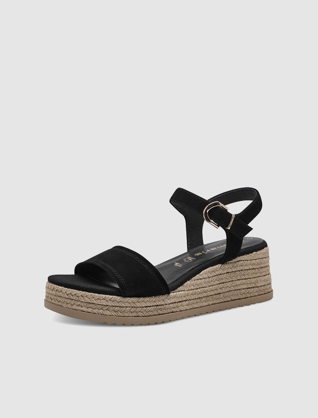 Schwarze Sandalen mit Keilabsatz und Riemchen.