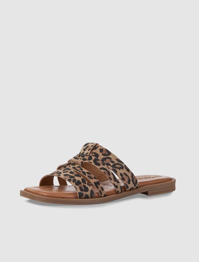 Leopardenmuster Sandalen mit flachem Absatz.