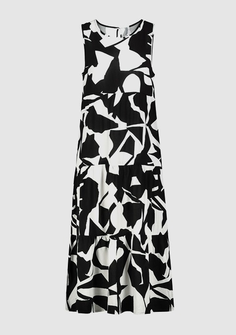 Ein ärmelloses, schwarz-weiß gemustertes Kleid mit geometrischen Formen.
