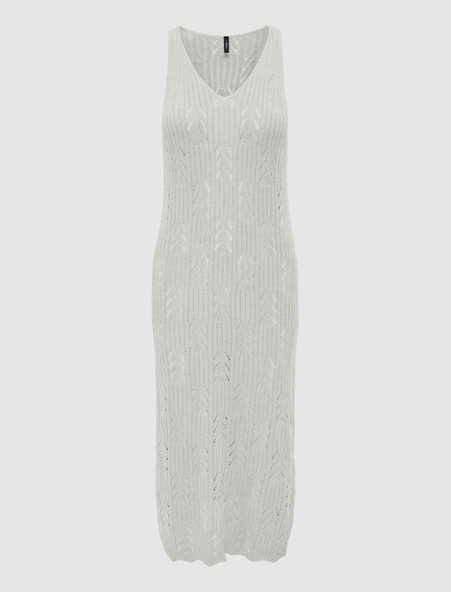 Ein ärmelloses, längliches Kleid in Weiß mit einem strukturierten Muster. Ein ärmelloses, längliches Kleid in Weiß mit einem strukturierten Muster.
