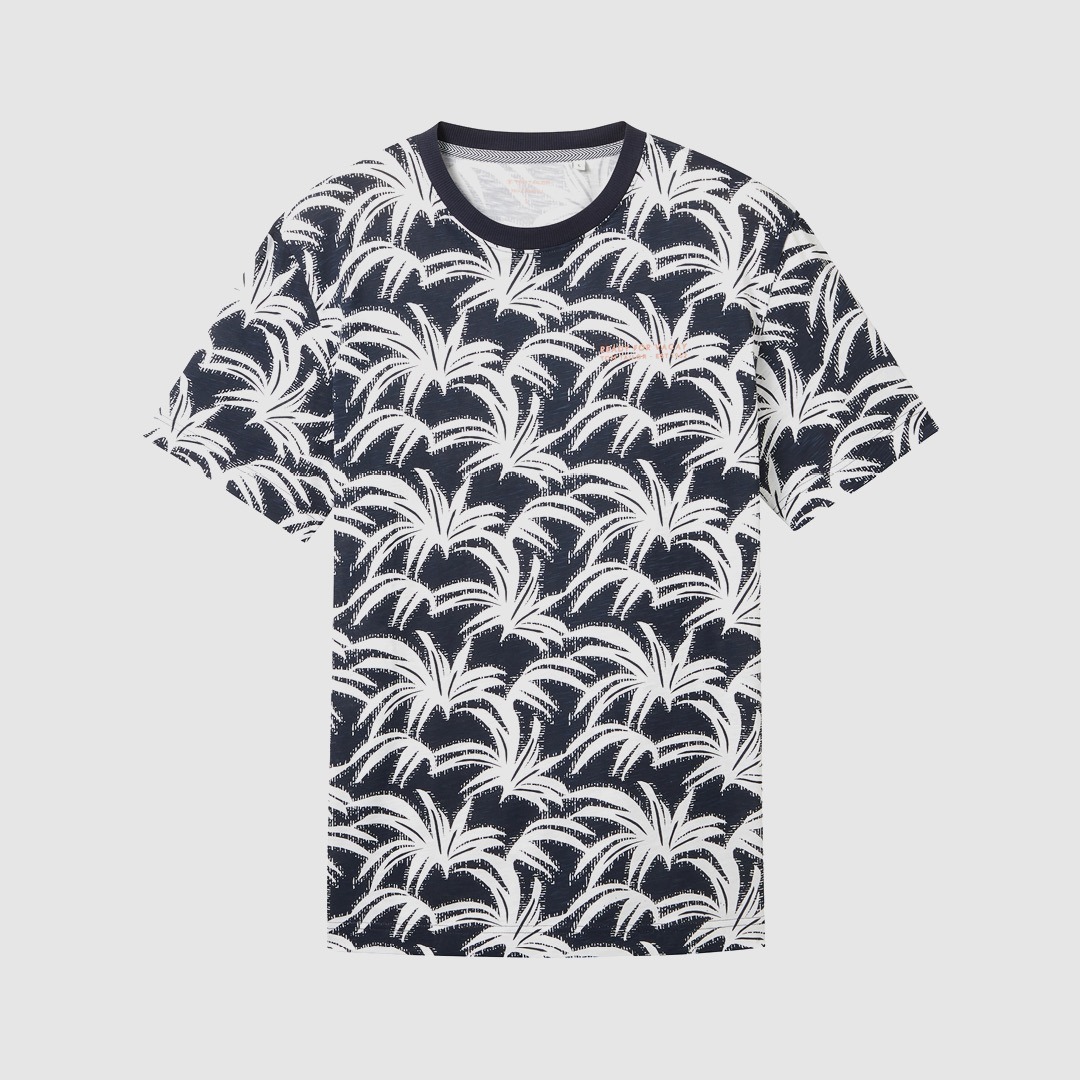 Ein T-Shirt mit einem palmblätterartigen Muster in Weiß auf dunkelblauem Hintergrund. Ein T-Shirt mit einem palmblätterartigen Muster in Weiß auf dunkelblauem Hintergrund.