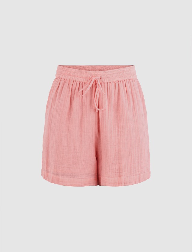 Rosa Shorts mit elastischem Bund und Kordelzug. Rosa Shorts mit elastischem Bund und Kordelzug.