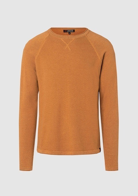 Ein oranger Pullover mit Rundhalsausschnitt und langen Ärmeln. Ein oranger Pullover mit Rundhalsausschnitt und langen Ärmeln.