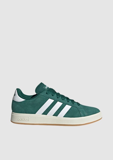 Grüne Adidas-Sneaker mit weißen Streifen.