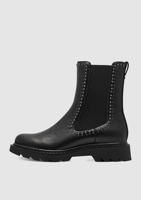 Schwarze Chelsea-Stiefel mit Nieten und rutschfester Sohle.