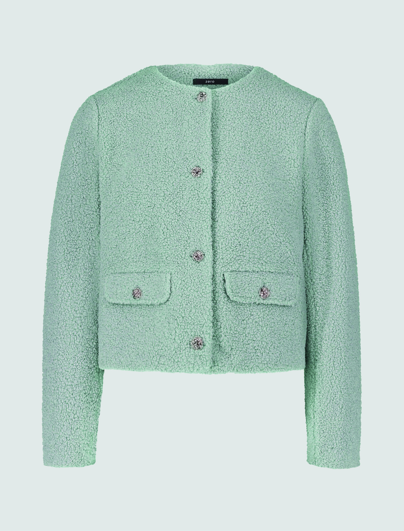 Eine mintgrĂŒne Jacke aus Teddystoff mit Rundhalsausschnitt und Knöpfen. Eine mintgrĂŒne Jacke aus Teddystoff mit Rundhalsausschnitt und Knöpfen.