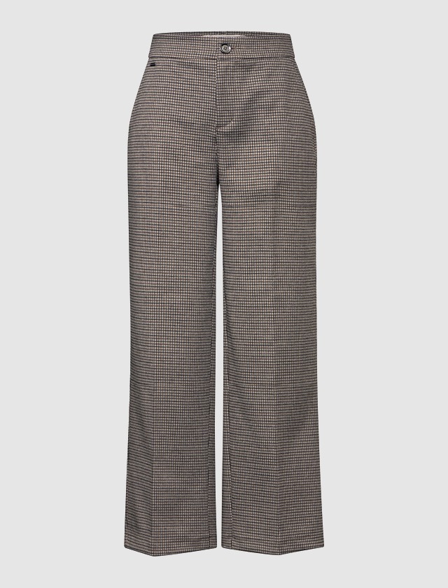 Helle, karierte Damenhose mit weitem Bein. Helle, karierte Damenhose mit weitem Bein.