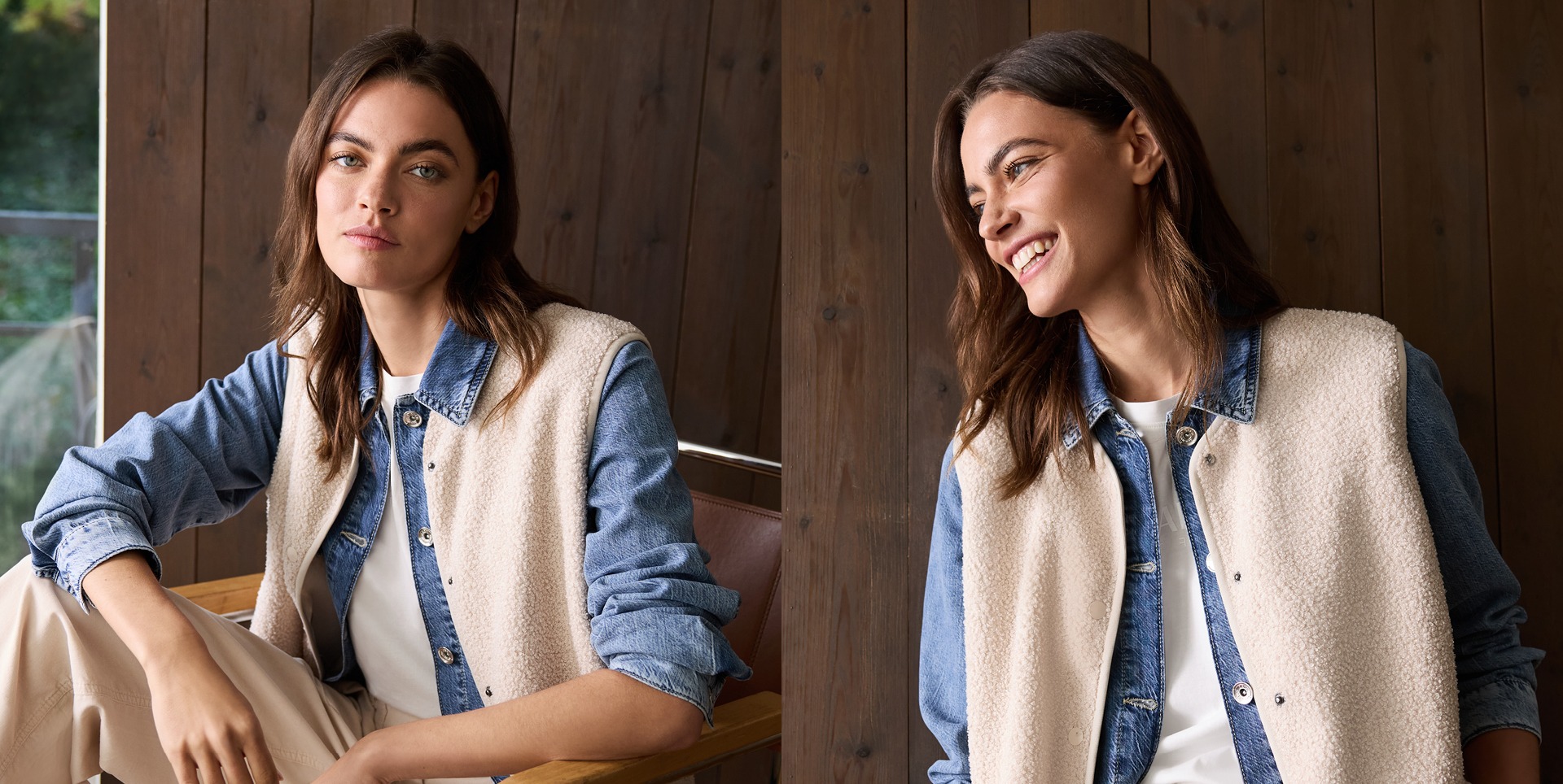Eine Frau sitzt in einem Holzgebäude, trägt eine Jeansjacke und eine helle Weste. Sie hat braune Haare und lächelt. Eine Frau sitzt in einem Holzgebäude, trägt eine Jeansjacke und eine helle Weste. Sie hat braune Haare und lächelt.